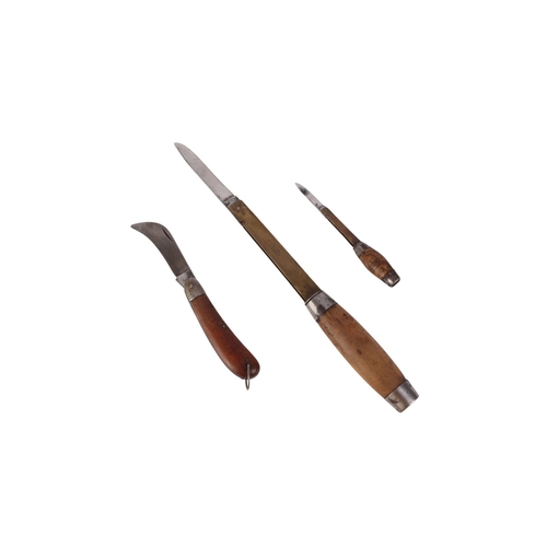 45 - Three Swedish barrel knives with treen handles, the largest 14cms long (closed) (3).