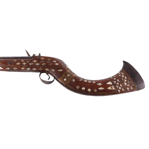 52 - A 19th century Jezail Indo-Persian flintlock rifle with mother of pearl inlaid decoration, 126cms lo... 