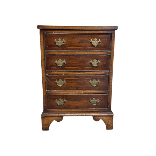 913 - A George III style yew wood chest of small proportions with four long drawers, on bracket feet, 44cm... 