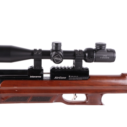59A - An Aselkon  MX9 .177 Interarms Air Guns air rifle with telescopic sight, 116cms long.