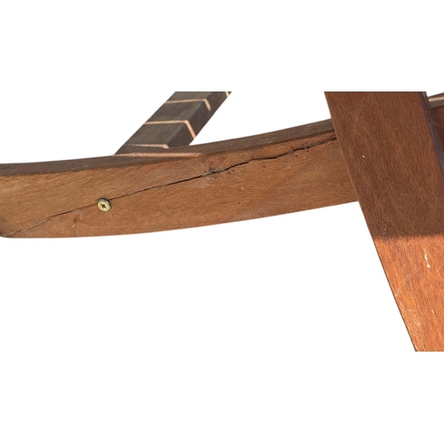 5 - A teak garden table, the circular top with collapsible base, 120cms diameter.