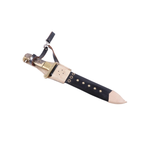102 - A mid 20th century original Texas hunters knife with a brass mounted antler handle, the blade decora... 