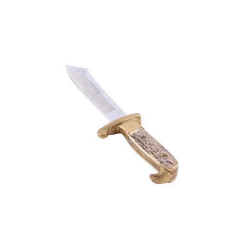 102 - A mid 20th century original Texas hunters knife with a brass mounted antler handle, the blade decora... 