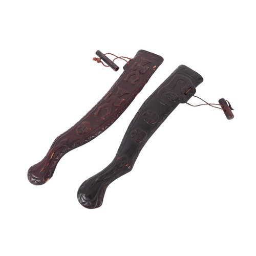 107 - Two early / mid 20th century Taiwan aboriginal swords with carved hardwood scabbards, each approx 61... 