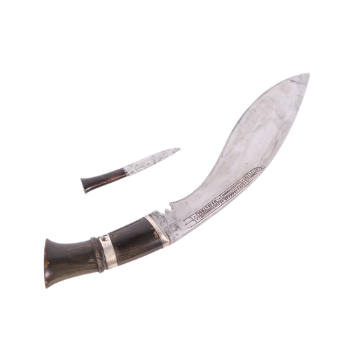 109 - A Dui Chira kukri with horn handle and white metal mounts, in a leather sheath, overall 46cms long, ... 