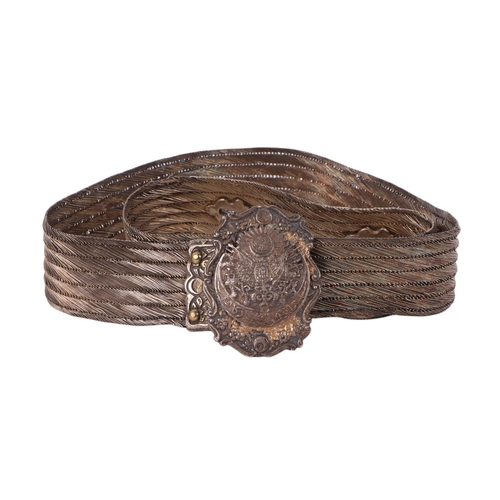 118 - An Indo-Persian bullion wire dress belt, the buckle with crest and calligraphy, 85cms long, 330g.