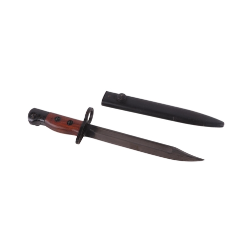 119 - A British No. 5 jungle carbine bayonet and scabbard, 32cms long.