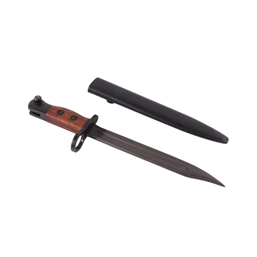 119 - A British No. 5 jungle carbine bayonet and scabbard, 32cms long.