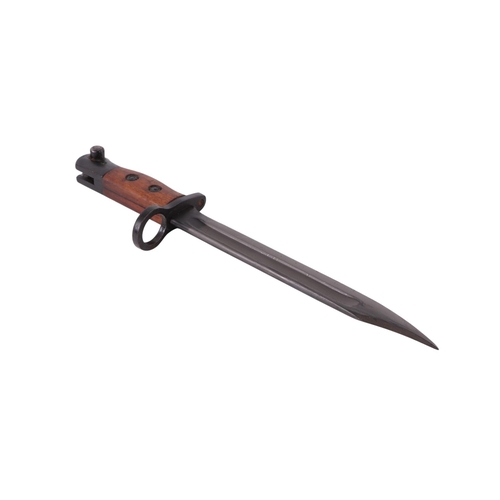 119 - A British No. 5 jungle carbine bayonet and scabbard, 32cms long.