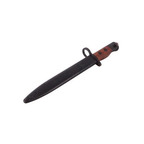 119 - A British No. 5 jungle carbine bayonet and scabbard, 32cms long.