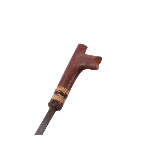 60 - A mid 20th century small Borneo Kayan Mandau Dayak sword and scabbard, overall 64cms, blade length 4... 