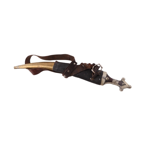 64 - A large mid 20th century Islamic Arab Wahhabite dagger / jambiya long knife, the horn hilt with whit... 