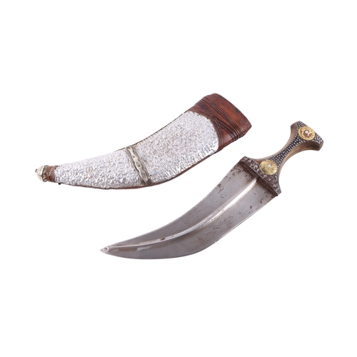 65 - A mid 20th century Islamic Yemini Arab jambiya knife / dagger, the horn handle with bronze alloy coi... 