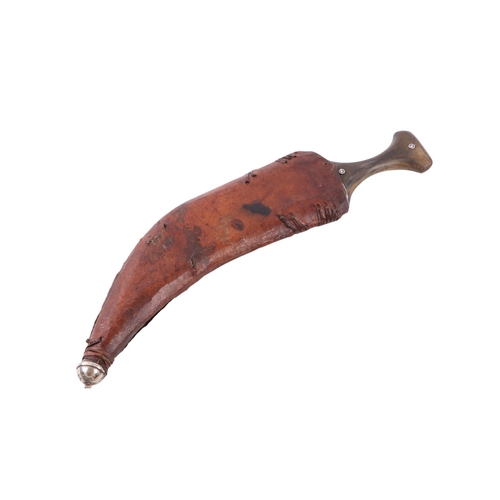 65 - A mid 20th century Islamic Yemini Arab jambiya knife / dagger, the horn handle with bronze alloy coi... 