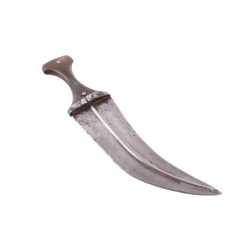 65 - A mid 20th century Islamic Yemini Arab jambiya knife / dagger, the horn handle with bronze alloy coi... 