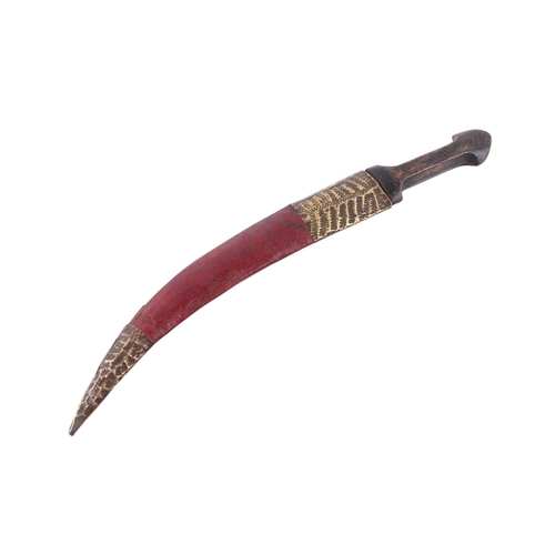 66 - An early 20th century Sudanese Islamic jambiya knife with wooden handle and brass mounted leather sc... 