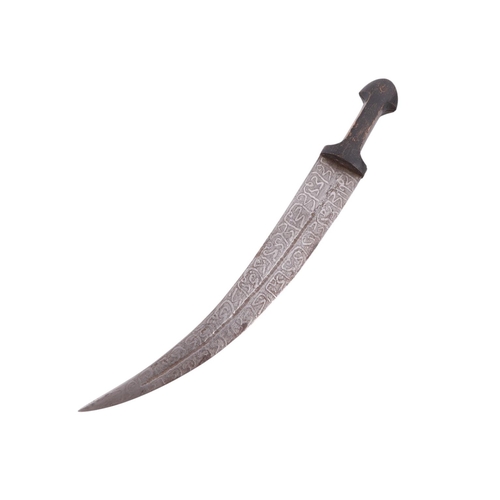 66 - An early 20th century Sudanese Islamic jambiya knife with wooden handle and brass mounted leather sc... 