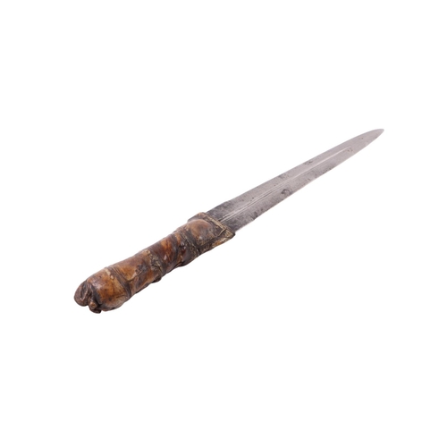 68 - A 19th century African Sudanese dagger with crocodile skin covered handle and double edged tapering ... 