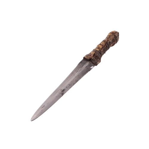 68 - A 19th century African Sudanese dagger with crocodile skin covered handle and double edged tapering ... 