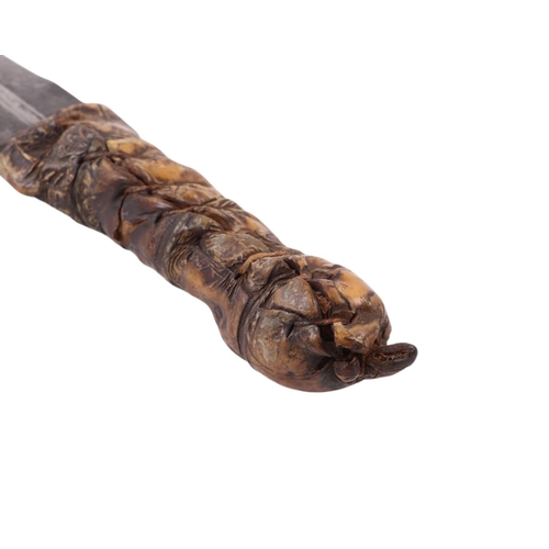 68 - A 19th century African Sudanese dagger with crocodile skin covered handle and double edged tapering ... 