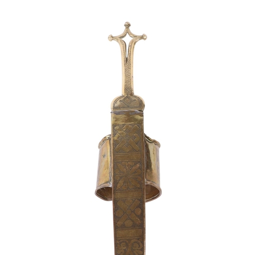71 - An early 20th century African Tuareg / Telek, Nupe tribe arm dagger with brass handle and scabbard h... 