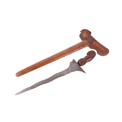 73 - A Javanese Madura Kris / Keris with carved hardwood handle and scabbard with stylised bird terminal ... 
