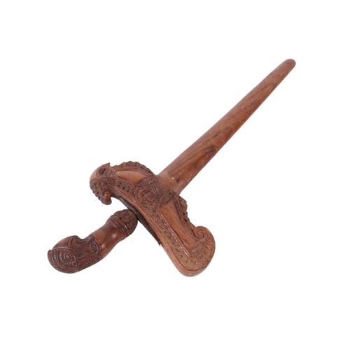 73 - A Javanese Madura Kris / Keris with carved hardwood handle and scabbard with stylised bird terminal ... 
