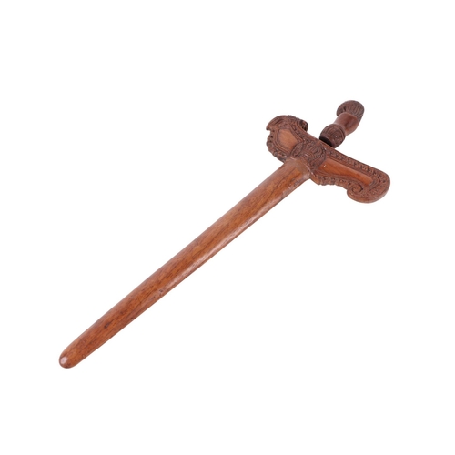 73 - A Javanese Madura Kris / Keris with carved hardwood handle and scabbard with stylised bird terminal ... 