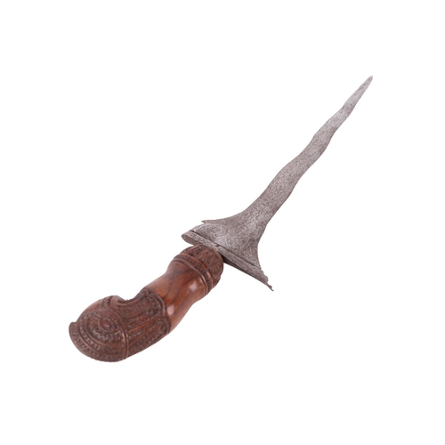 73 - A Javanese Madura Kris / Keris with carved hardwood handle and scabbard with stylised bird terminal ... 