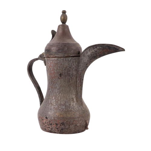 733 - A Turkish / Islamic brass dallah coffee pot, 35cms high; together with a tinned copper Islamic / Tur... 