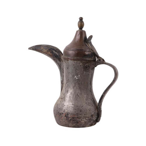 733 - A Turkish / Islamic brass dallah coffee pot, 35cms high; together with a tinned copper Islamic / Tur... 