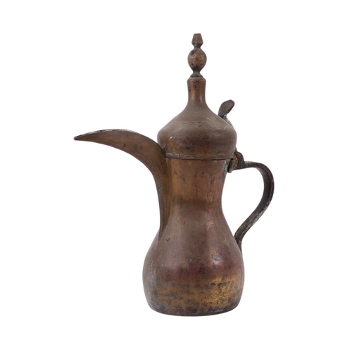 733 - A Turkish / Islamic brass dallah coffee pot, 35cms high; together with a tinned copper Islamic / Tur... 