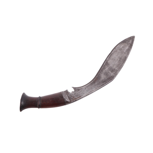 81 - An early 20th century regimental kukri knife with various indistinct stamped marks to the blade, the... 