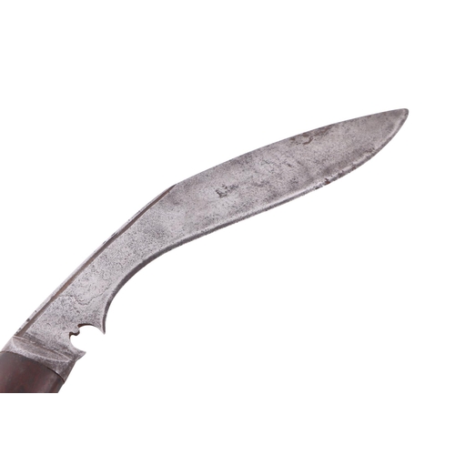 81 - An early 20th century regimental kukri knife with various indistinct stamped marks to the blade, the... 