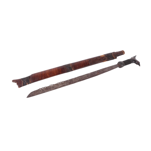 82 - An early 20th century Borneo Kayan Mandau sword with wooden and woven rattan handle, with rattan bou... 
