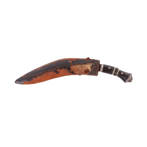 84 - A mid 20th century kukri knife with nickel mounted horn handle and lion terminal, the chromed blade ... 