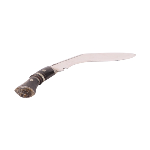84 - A mid 20th century kukri knife with nickel mounted horn handle and lion terminal, the chromed blade ... 