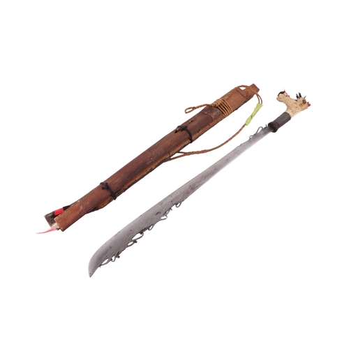 85 - An early to mid 20th century Borneo Mandau sword with carved stag antler and steel wire grip handle ... 