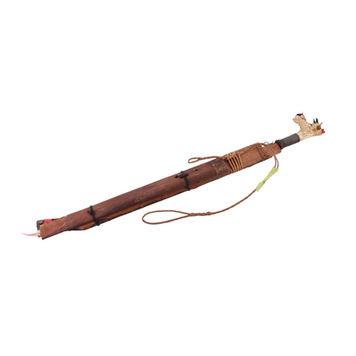 85 - An early to mid 20th century Borneo Mandau sword with carved stag antler and steel wire grip handle ... 