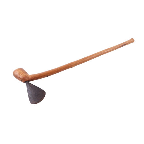 88 - An African Congo Chokwe war axe with steel blade and wooden ball ended shaft, 63cms long.