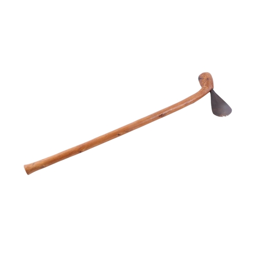 88 - An African Congo Chokwe war axe with steel blade and wooden ball ended shaft, 63cms long.