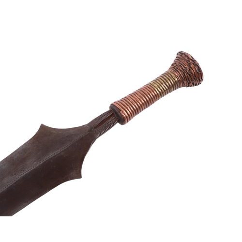 90 - An early 20th century African Ngombe sickle sword with copper and brass bound handle and fine steel ... 