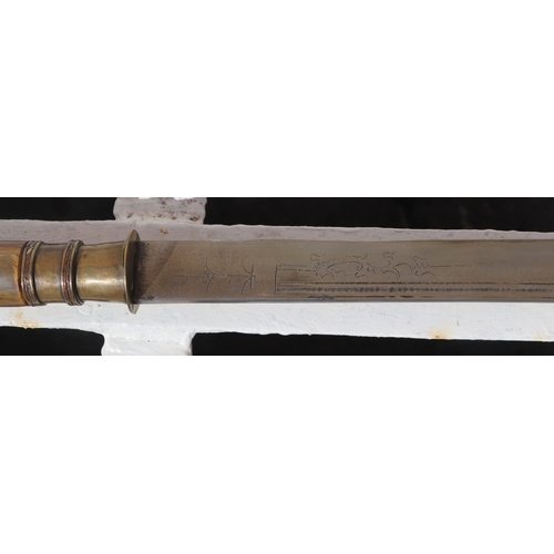 86 - A Yunnan Upper Vietnam border Dao / Dha sword with green buffalo horn and brass handle, in a brass a... 