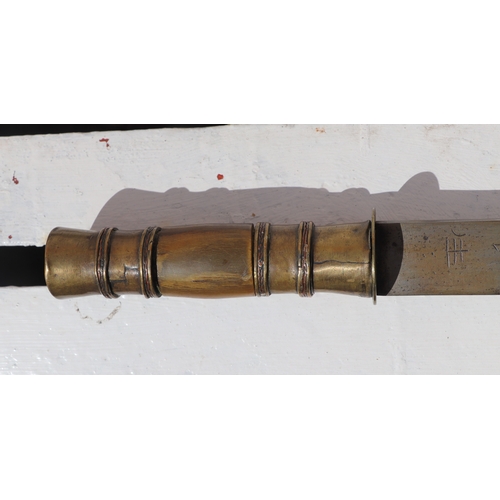 86 - A Yunnan Upper Vietnam border Dao / Dha sword with green buffalo horn and brass handle, in a brass a... 