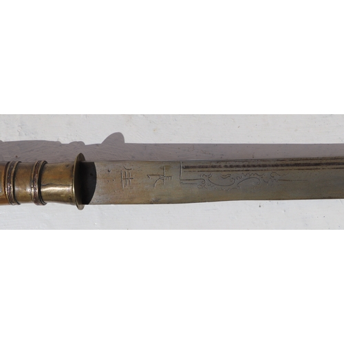 86 - A Yunnan Upper Vietnam border Dao / Dha sword with green buffalo horn and brass handle, in a brass a... 
