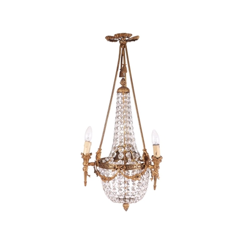 A late 19th century French Empire style glass and gilt metal bag ...
