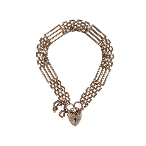 A 9ct gold gate bracelet with heart shaped padlock clasp, 10.4g, boxed.