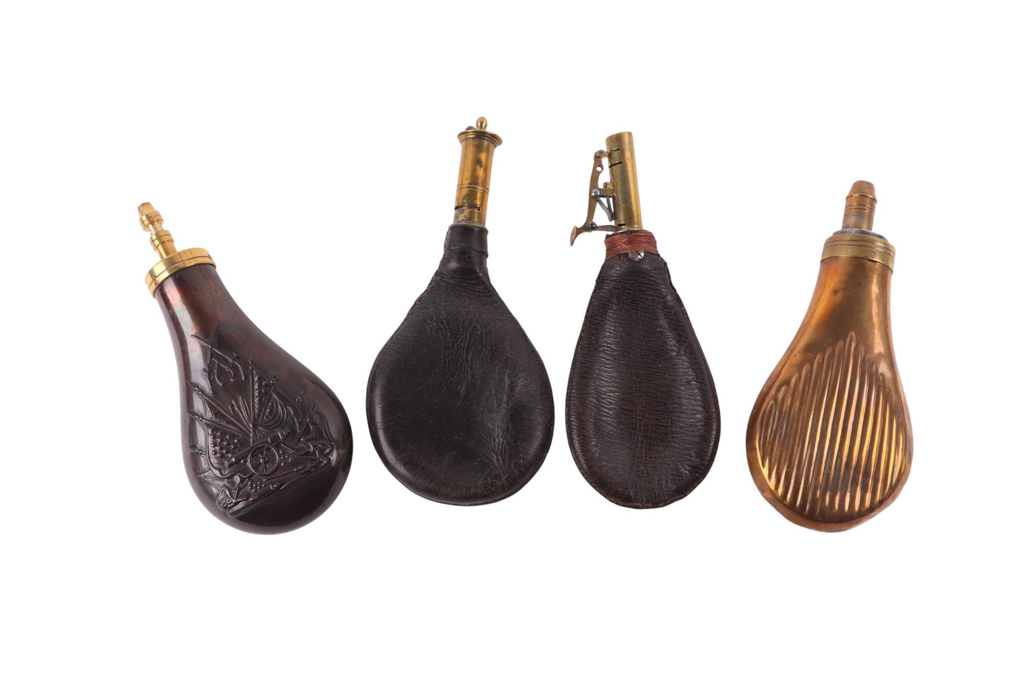 Four powder or shot flasks. (4)