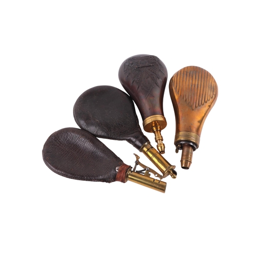 Four powder or shot flasks. (4)