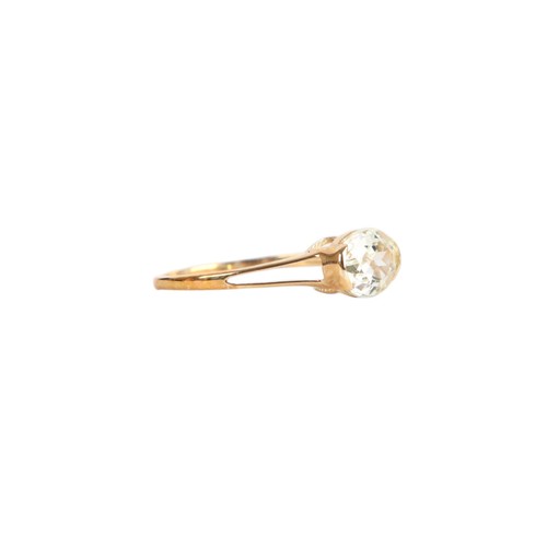 A 9ct gold solitaire dress ring, set with a single oval pale yellow ...